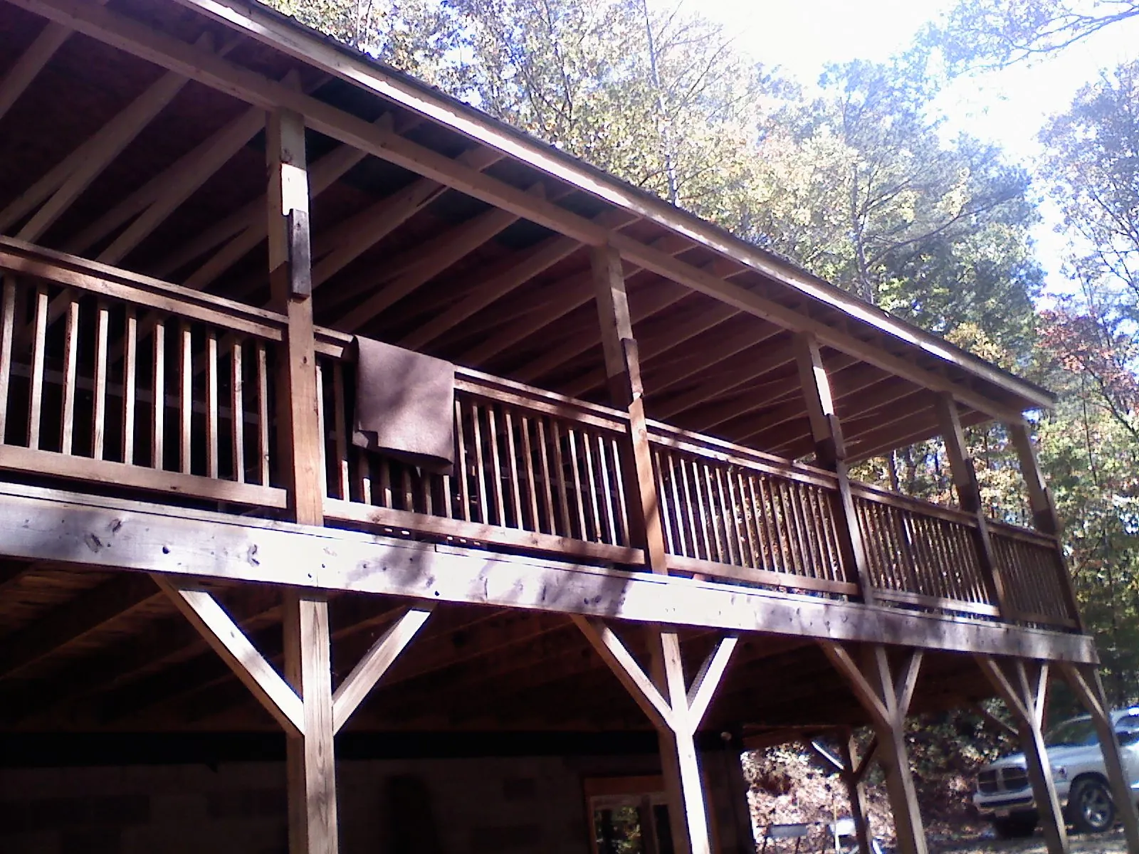 Timber framing under a new elevated porch and deck — Roof Leak Repair in West River by Roofing Brothers